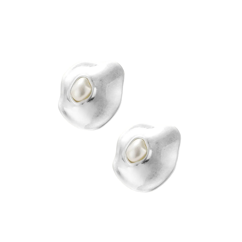 Organic-shaped eco-zinc alloy stud earrings with resin pearl centers and sterling silver posts on white background.