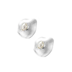 Organic-shaped eco-zinc alloy stud earrings with resin pearl centers and sterling silver posts on white background.