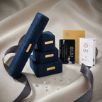 Sterling silver adjustable ring featuring four-leaf clover design with green center moissanite and clear accent stones