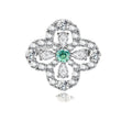 Sterling silver adjustable ring featuring four-leaf clover design with green center moissanite and clear accent stones