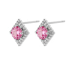 Sterling silver diamond-shaped stud earrings with pink moissanite center stones and crystal halo setting on white background