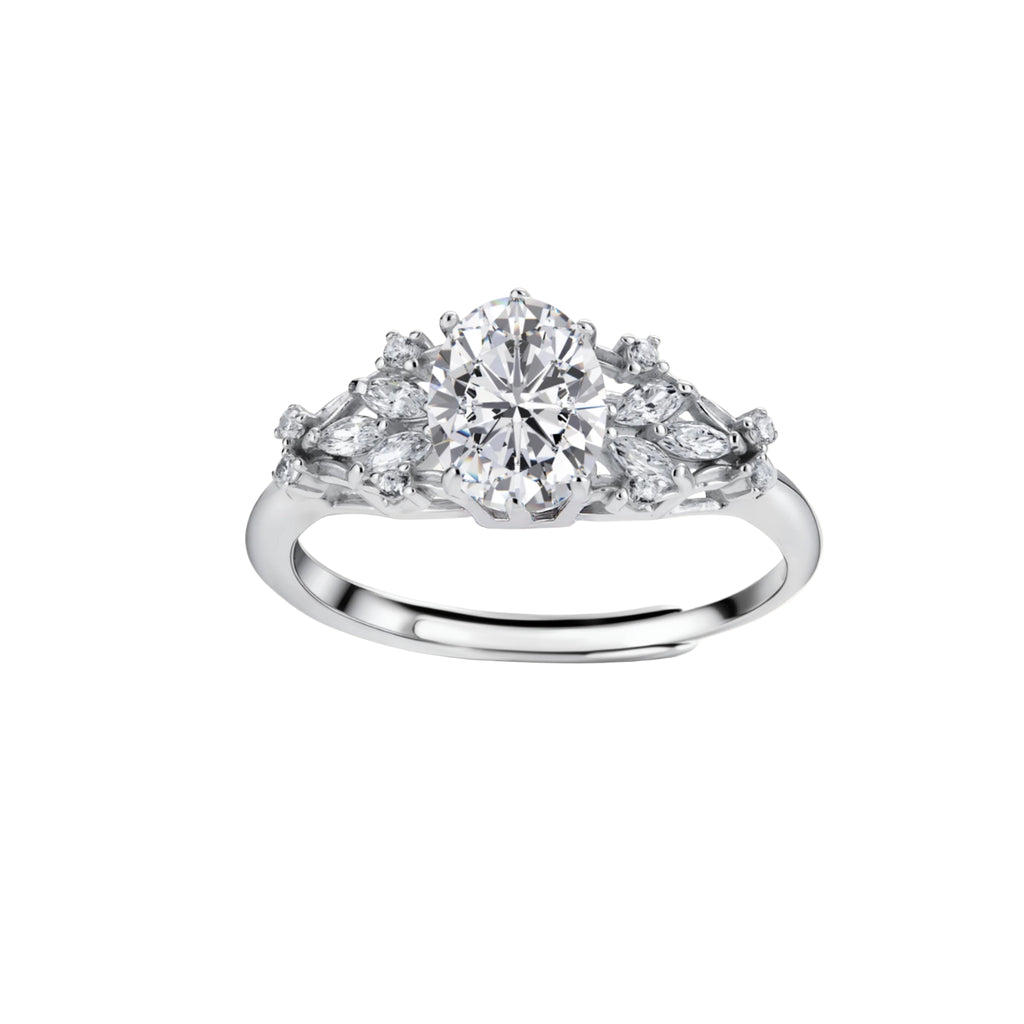 Sterling silver ring with oval moissanite center stone surrounded by smaller accent stones in ornate setting