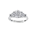 Sterling silver ring with oval moissanite center stone surrounded by smaller accent stones in ornate setting