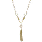 Long gold-plated necklace with freshwater pearls, chunky chain links, and flowing tassel pendant
