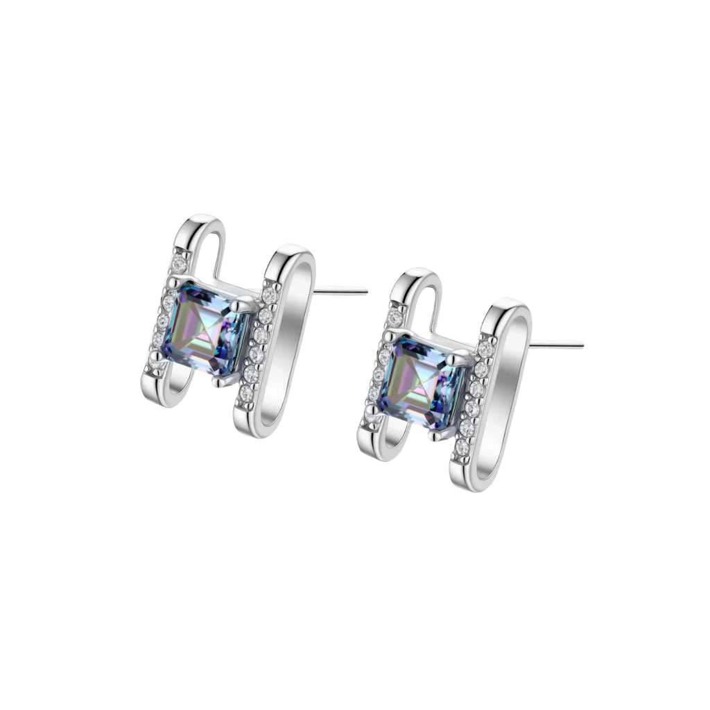 Square moissanite studs in sterling silver geometric setting showing rainbow prismatic fire on white background.