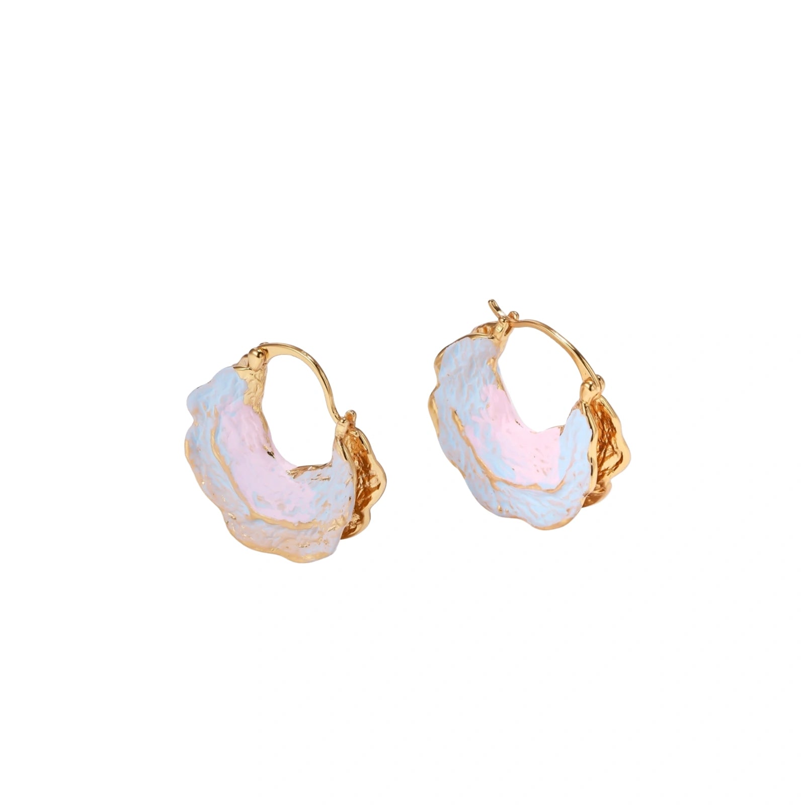 Shell-shaped hoop earrings with iridescent blue-pink enamel and gold trim on cream background