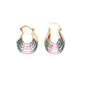 Gold hoop earrings with gradient blue-to-pink enamel in ribbed fan design on beige background