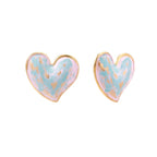 Heart-shaped stud earrings with swirled turquoise and pink enamel in gold-plated frames on cream background