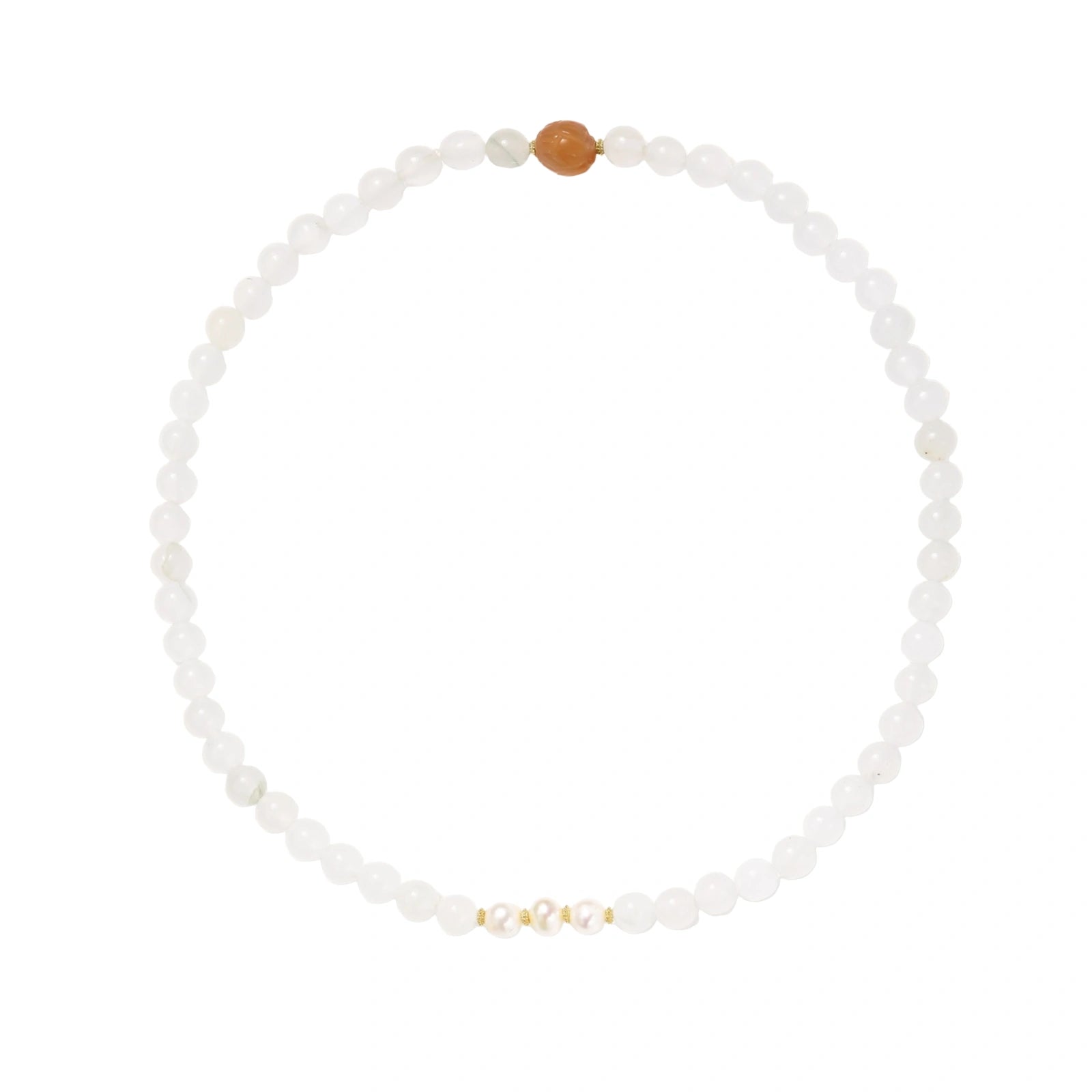 Three layered white beaded bracelets with carved orange agate lotus centerpiece and freshwater pearls on cream background.