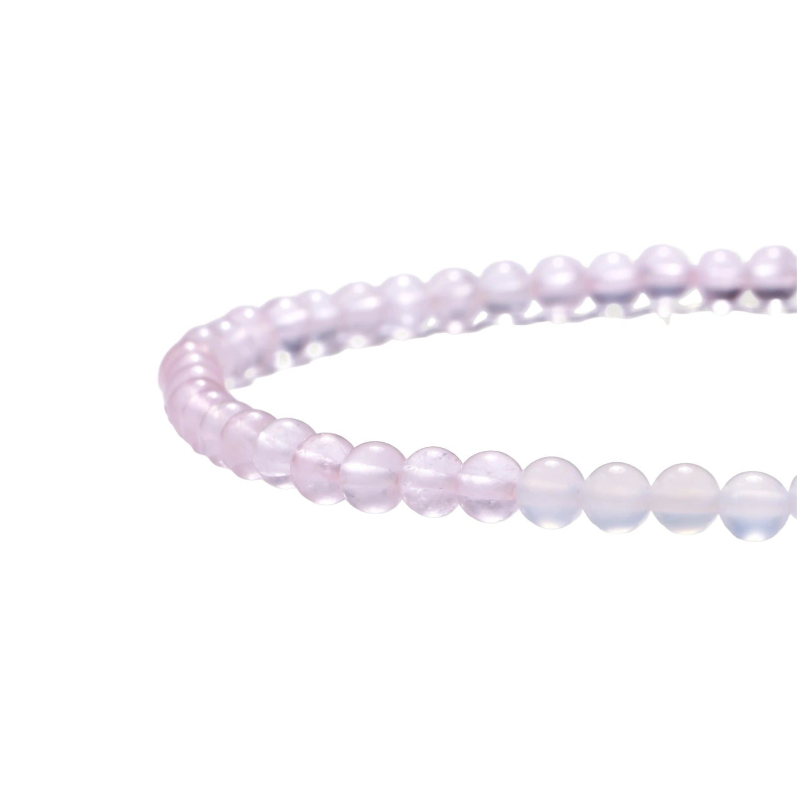 Double-wrap lavender beaded bracelet with rose quartz, pearls, gold vermeil charm and pink tassel on white background.