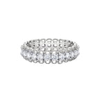 Sterling silver eternity ring with continuous row of brilliant moissanite stones in scalloped crown setting with milgrain detail