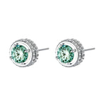 Round green moissanite stud earrings in sterling silver halo settings with brilliant sparkle on white background.