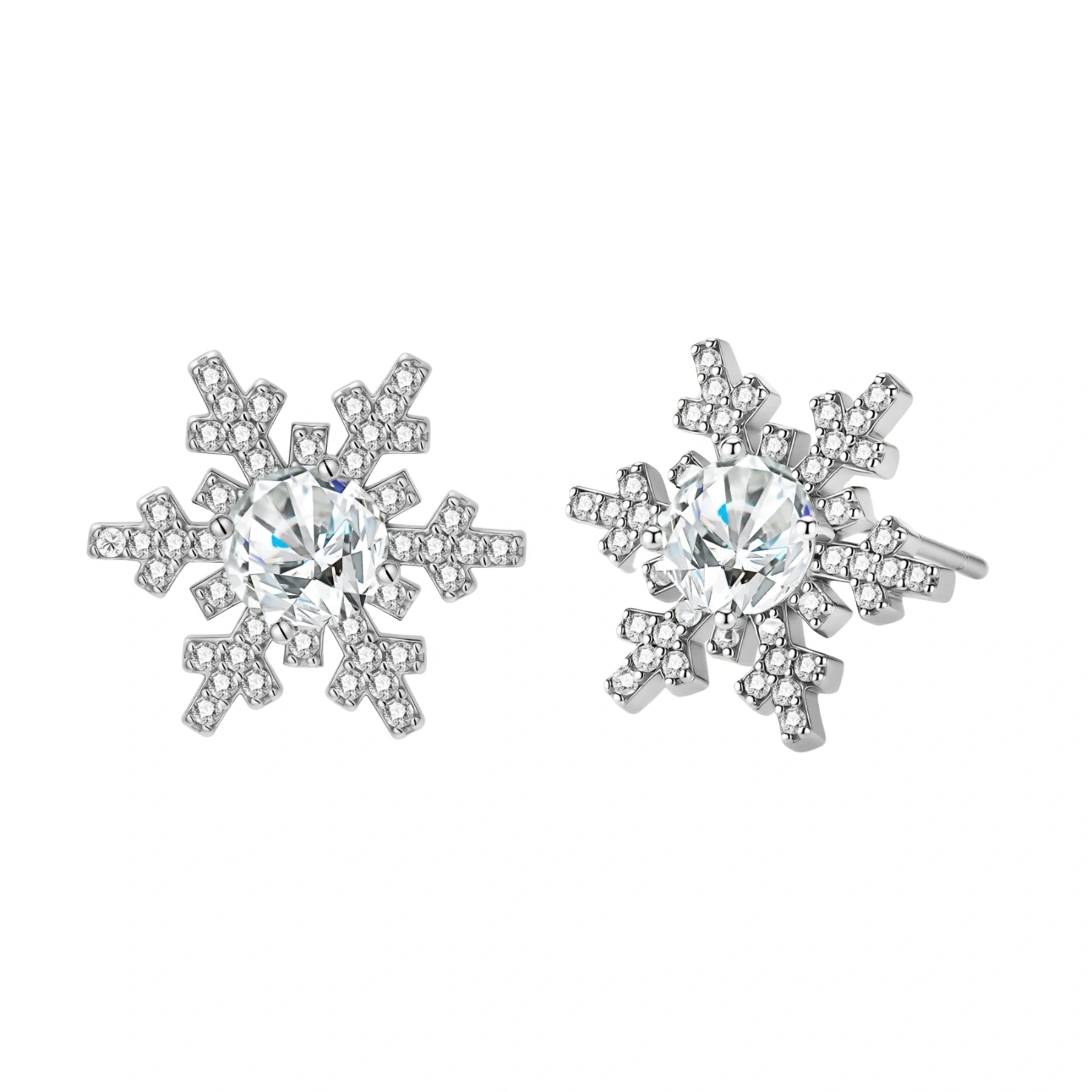 Sterling silver snowflake stud earrings with brilliant moissanite centers and intricate geometric patterns on cream background