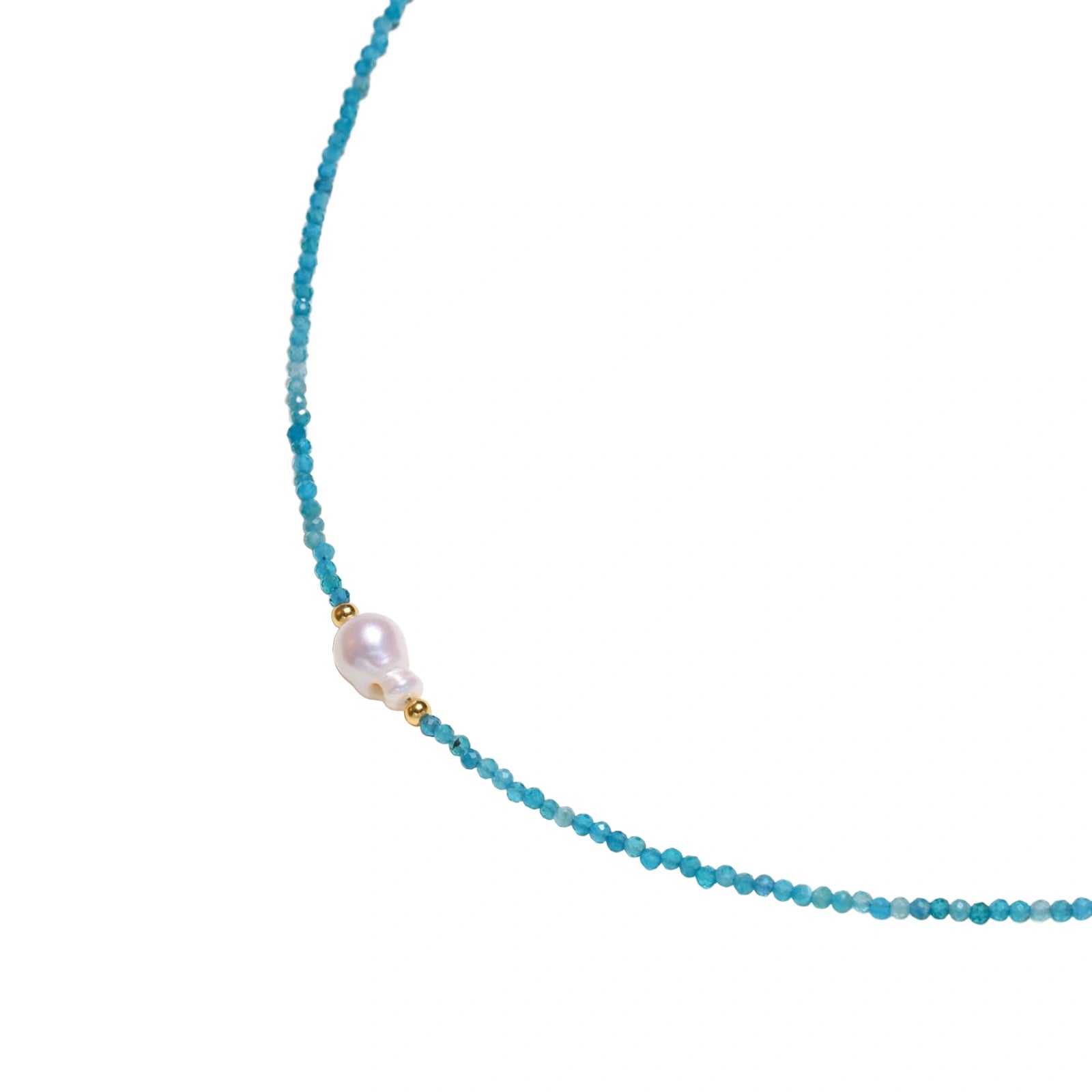 Delicate gold vermeil necklace with teal apatite beads and freshwater pearl on white background.