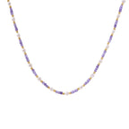 Delicate 18K gold vermeil necklace with alternating lavender zirconia beads and white freshwater pearls on cream background