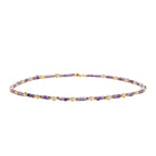 Delicate 18K gold vermeil necklace with alternating lavender zirconia beads and white freshwater pearls on cream background