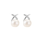 Rhodium-plated silver stud earrings with sparkling X design above lustrous round freshwater pearls on white background.