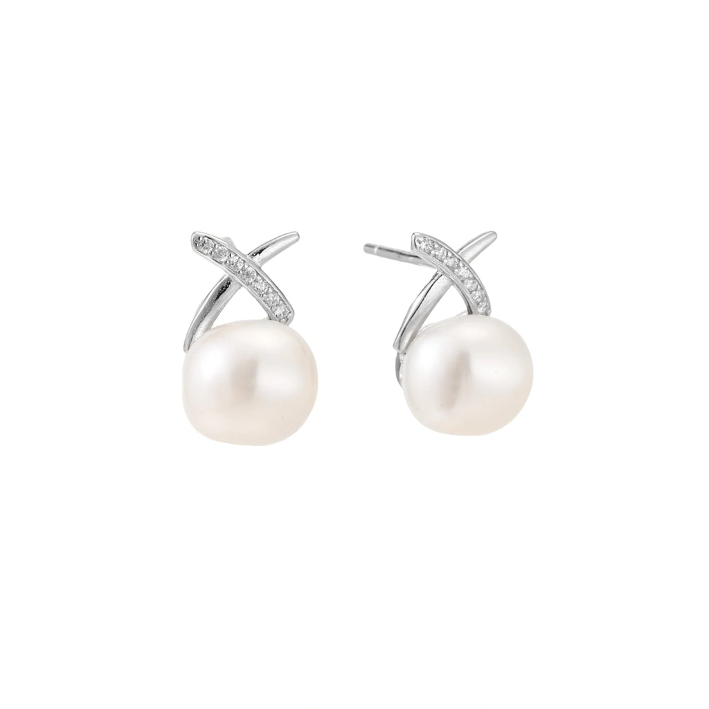 Rhodium-plated silver stud earrings with sparkling X design above lustrous round freshwater pearls on white background.