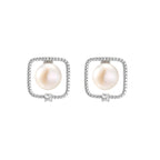 Rhodium-plated silver stud earrings with cushion frame, centered freshwater pearl, and tiny crystal accent