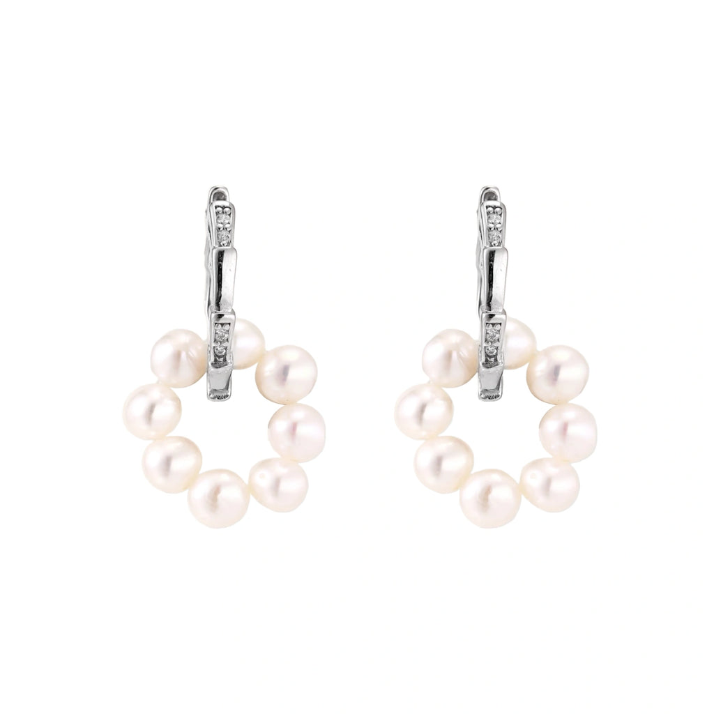 Rhodium-plated silver hoop earrings with freshwater pearls arranged in crescent formation and diamond accents