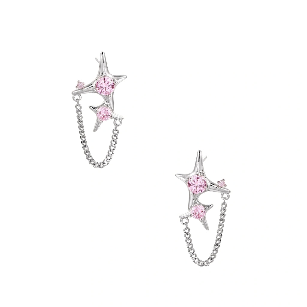 Pair of silver star-shaped ear climbers with pink zirconia stones connected by delicate chains