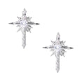 Silver starburst earrings with radiating points and dagger drop design featuring clear zirconia stones