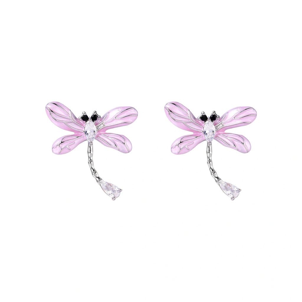 Long drop earrings with translucent lavender enamel dragonfly wings and white gold plated segmented bodies on white background
