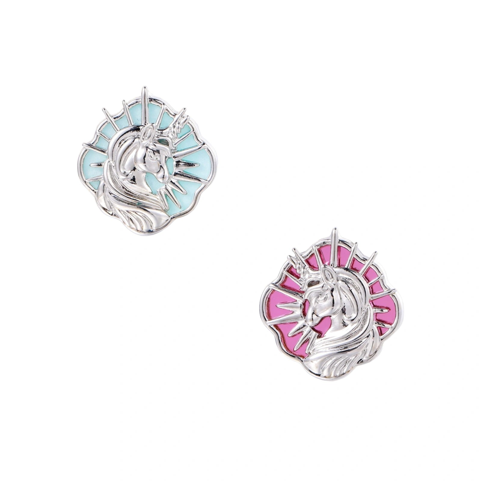 Silver unicorn stud earrings with pastel blue and pink enamel stones in sunburst prong settings on cream background