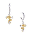 Ornate gold plated cross drop earrings with rose details and sparkling zirconia stones on white background.