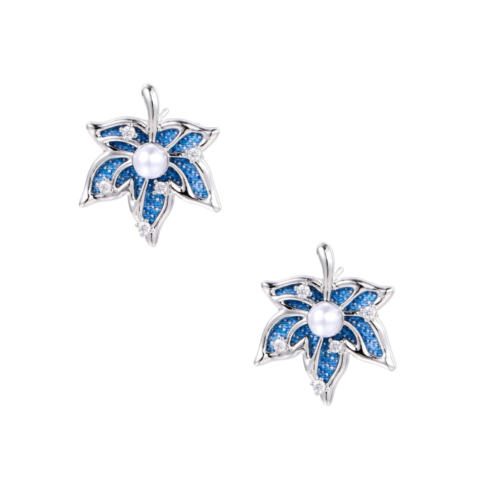 Blue denim fabric star-flower stud earrings with white pearl center and crystal accents on white gold-plated frame
