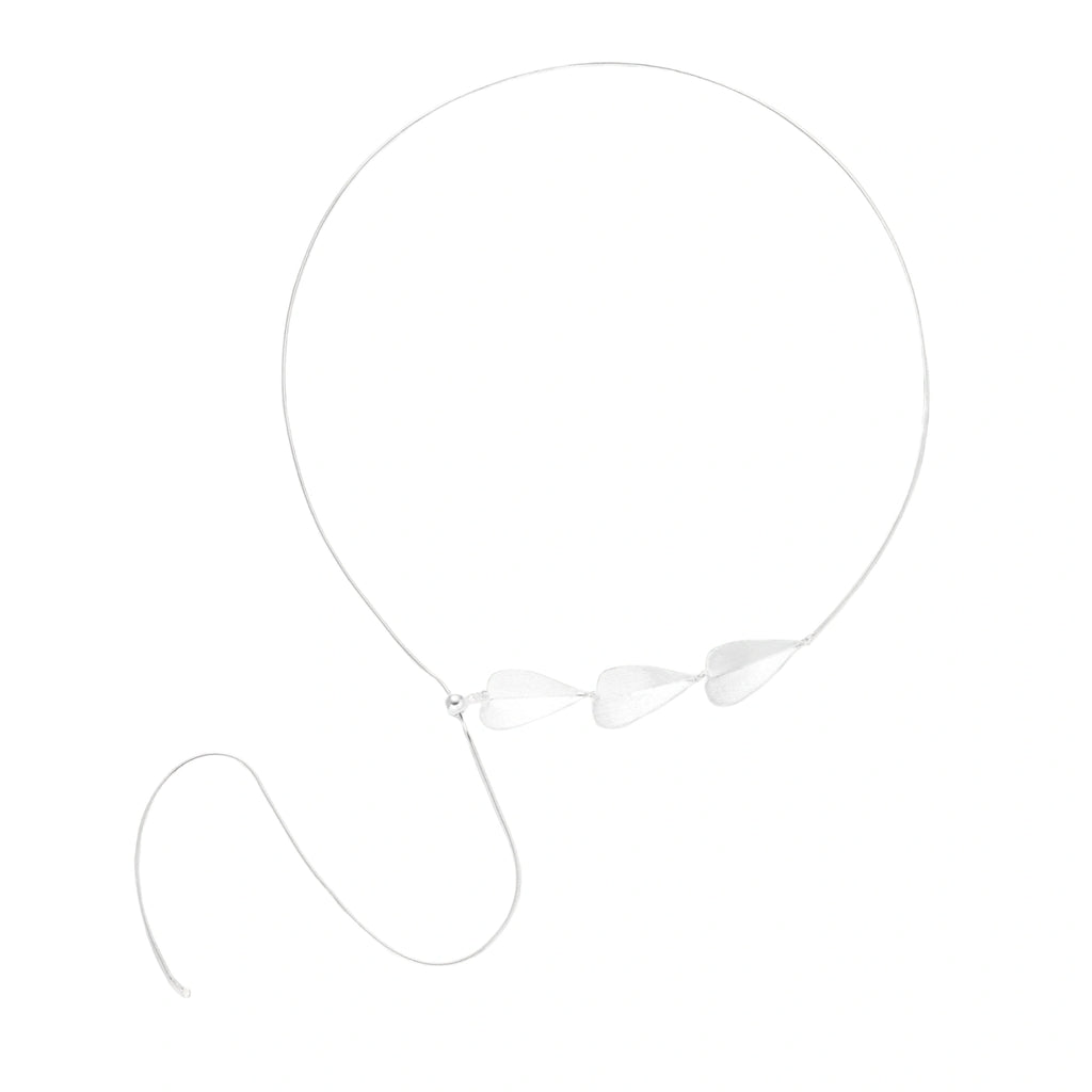 Minimalist sterling silver necklace with three brushed leaf-shaped pendants on delicate chain against white background