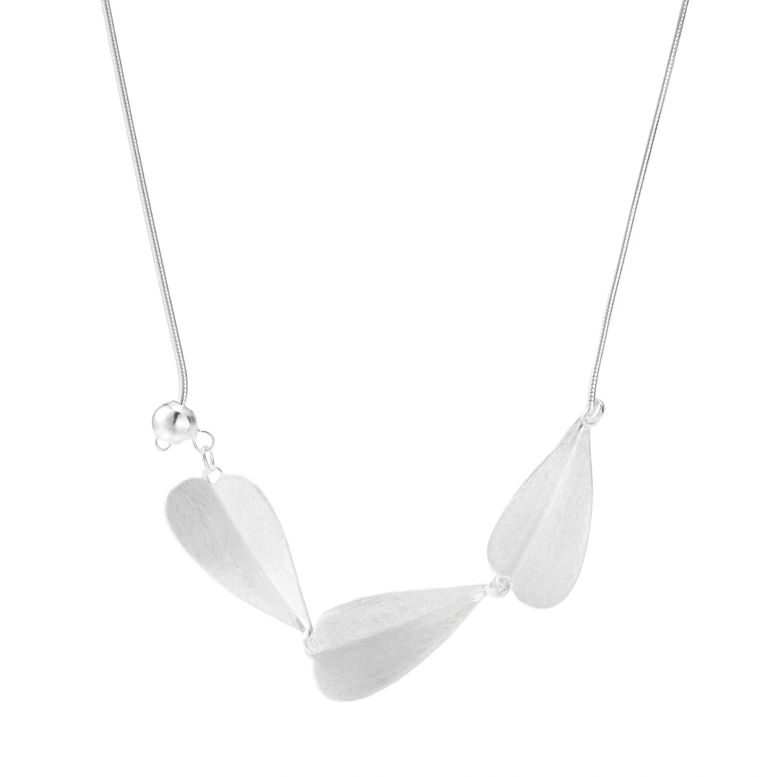Minimalist sterling silver necklace with three brushed leaf-shaped pendants on delicate chain against white background