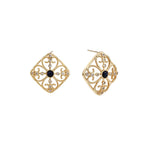 Gold filigree stud earrings with navy lapis lazuli center stone and mother-of-pearl accents in ornate quatrefoil design