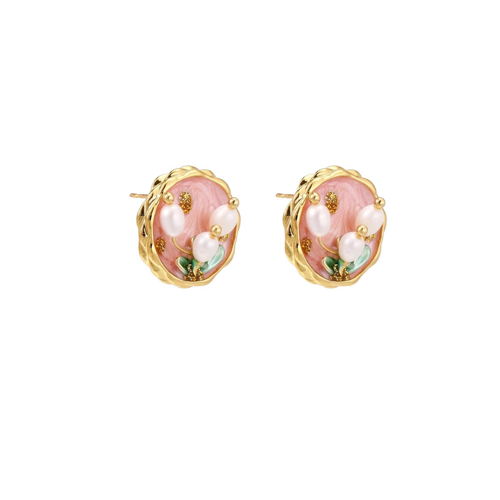 Round stud earrings with pink enamel, three white freshwater pearls, green leaves, and gold-plated braided border