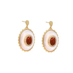 Gold-plated drop earrings with layered oval mother-of-pearl and cognac gemstone center framed by crystal halo