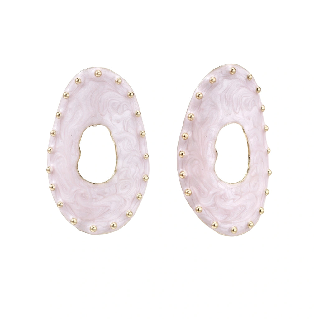 Oval lavender enamel earrings with marbled finish and gold-plated beaded border on cream background.