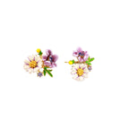 Cluster-style stud earrings with purple pansies, white daisies, yellow centers, and green leaves in glossy enamel finish