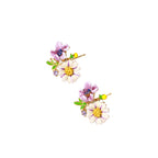 Cluster-style stud earrings with purple pansies, white daisies, yellow centers, and green leaves in glossy enamel finish