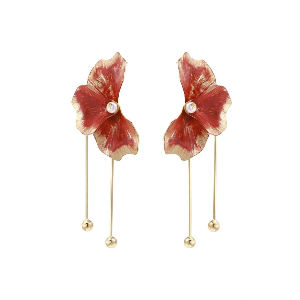 Red enamel flower earrings with gold-plated stems, central pearl, and gradient coral-to-gold petals on white background