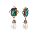 Ornate gold-plated drop earrings with rectangular abalone shell centers, crystal accents, and baroque pearl drops