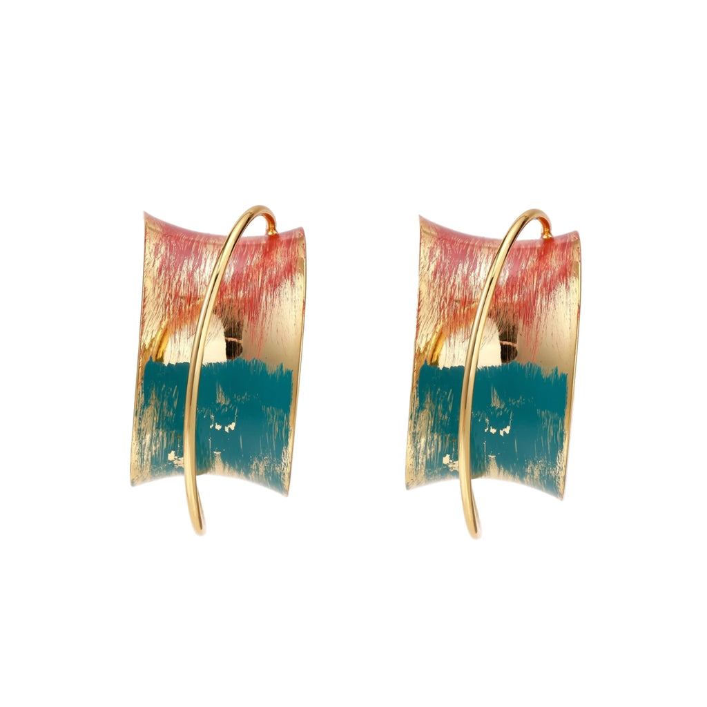 Gold-plated hoop earrings with teal and coral enamel brushstroke design on cream background