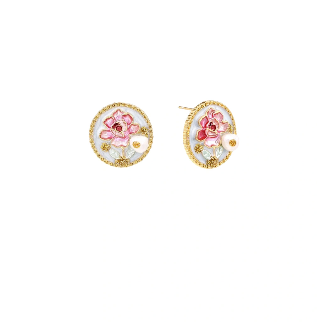 Gold-rimmed circular stud earrings with hand-painted pink peony enamel and pearl accents on white background