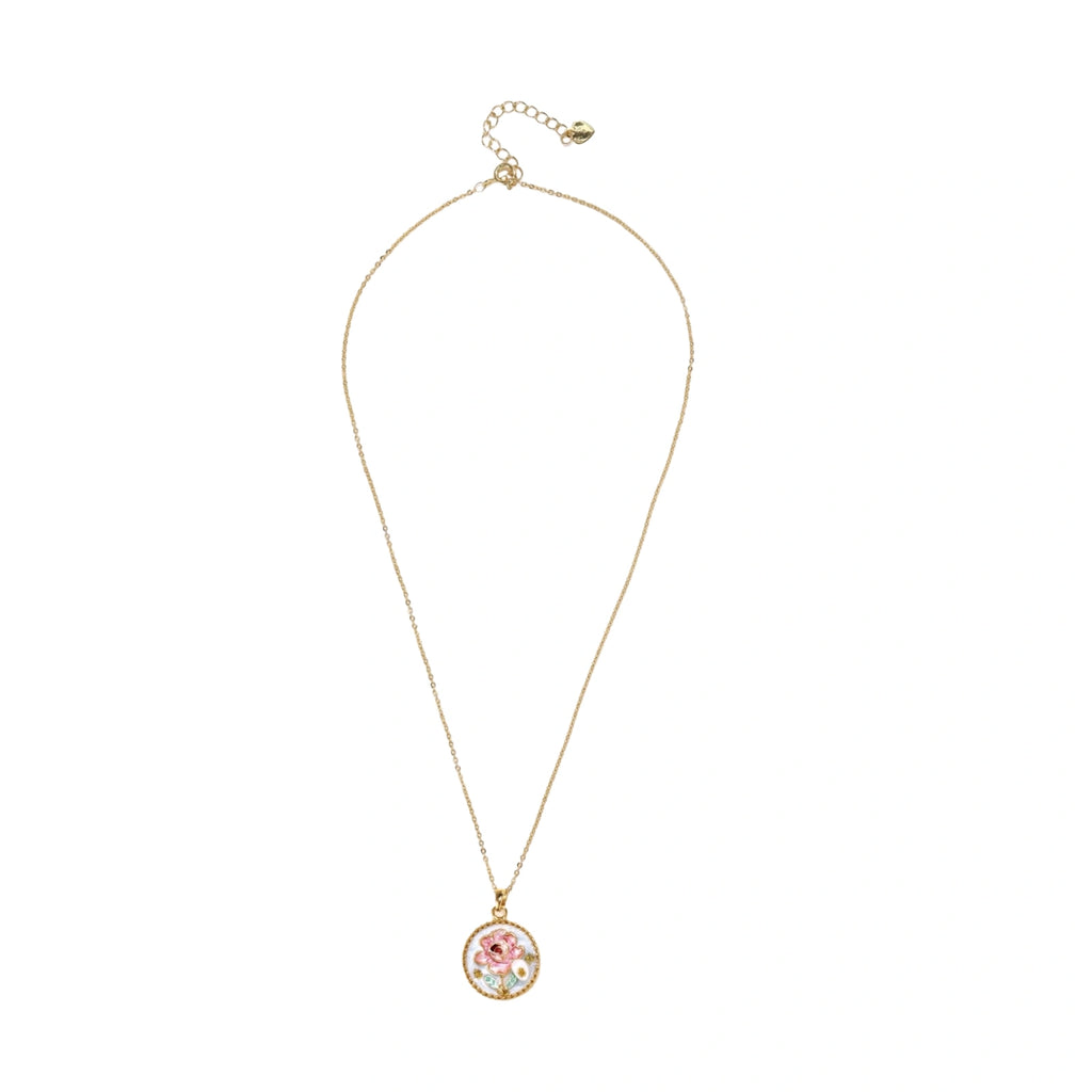 Gold-plated circular pendant with pink enamel rose, pearl background, and delicate beaded border on chain