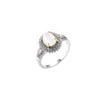 Vintage-style cocktail ring with luminous cat's eye center stone surrounded by turquoise and crystal double halo on white gold plated band