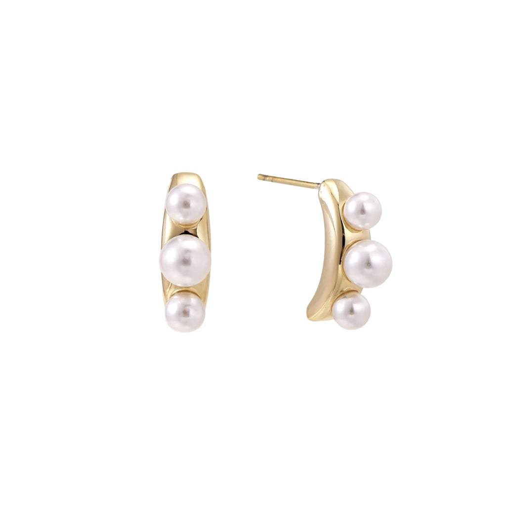 14K gold-plated curved stud earrings with three white freshwater pearls aligned vertically on cream background
