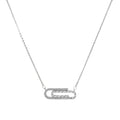 White gold plated necklace with dual-frame geometric pendant featuring crystal pavé border on pale background.