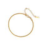 Delicate 18K gold-plated stainless steel bracelet with textured beaded chain on cream background