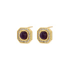 Gold-plated octagonal stud earrings with burgundy liuli centers and cubic zirconia halos on white background