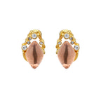 Gold-plated baroque stud earrings with coral-pink liuli stones and cubic zirconia crystals on white background.