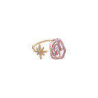 Adjustable gold ring with pink baroque freshwater pearl and crystal-studded star charm on white background
